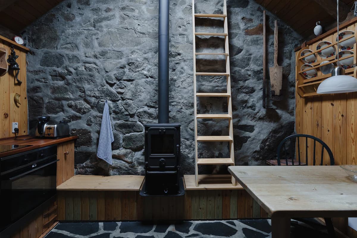 orca · cabin · sea & mountain view · calm village